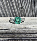 Vintage Platinum Emerald and Round & Baguette Diamond Ring