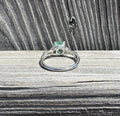 Vintage Platinum Emerald and Round & Baguette Diamond Ring